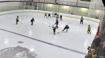 Getting to the loose puck, making the perfect backhand pass for the assist! Image