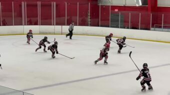 Hard back check leads to gaining possession and getting the puck to my teammate for the assist! Image