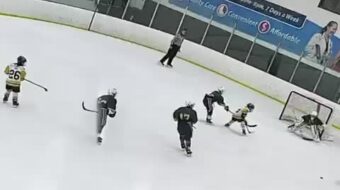 Picking up the assist when my teammate cleans up the rebound off my backhand shot! Image