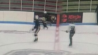 Don’t underestimate the strength of a 7 year old when he has the puck and is being shoved by an 11 year old.. Image